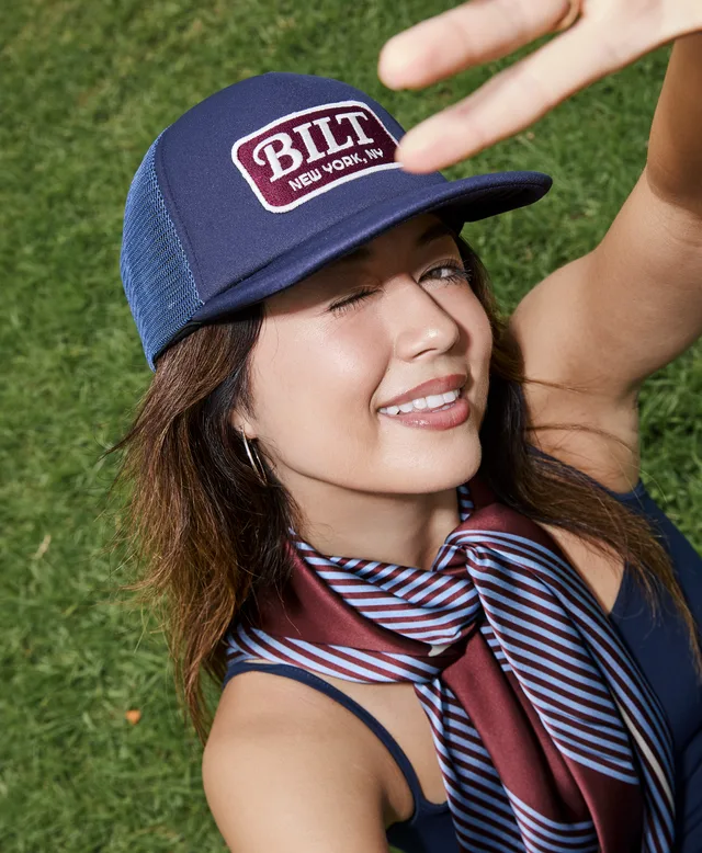 A member in a Bilt cap and scarf