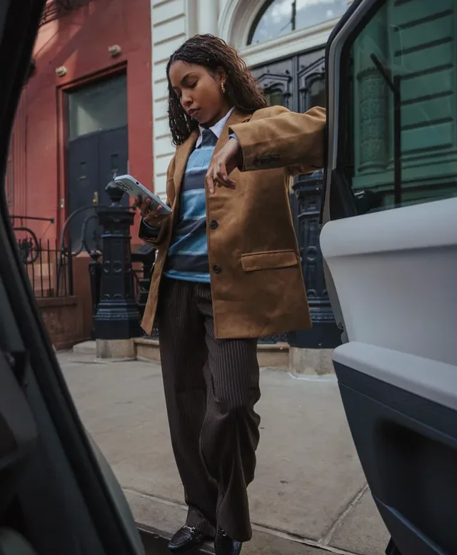 A member stepping into a Lyft